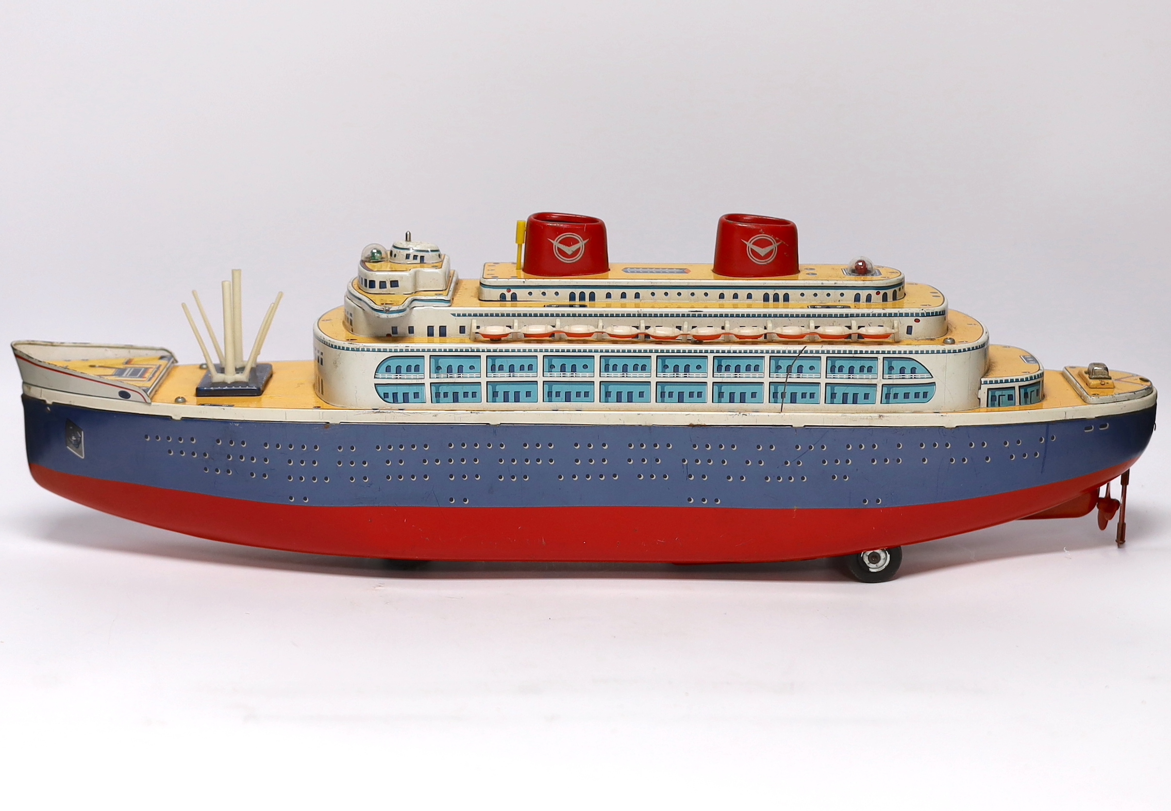 A boxed 1960s Modern Toys, Japan tinplate Queen of the Sea battery operated ocean liner, 54cm long